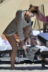http://img206.imagevenue.com/loc134/th_312660597_Mischa_Barton_Bikini_Candids_on_the_Beach_in_Miami_December_27_2011_226_122_134lo.jpg